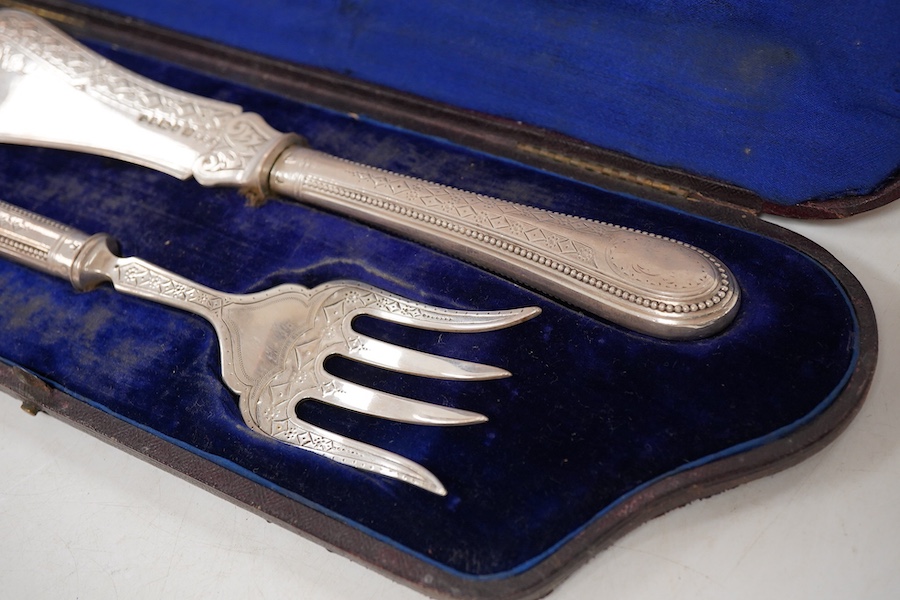 A cased pair of Victorian silver fish servers, with beaded handles, Martin, Hall & Co, Sheffield, 1871, knife 28.7cm.